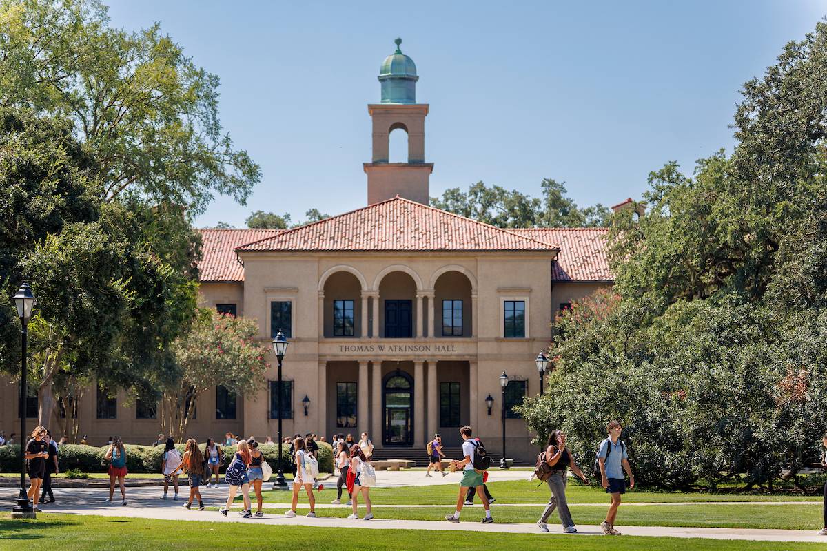 Atkinson Hall with students walking in front 