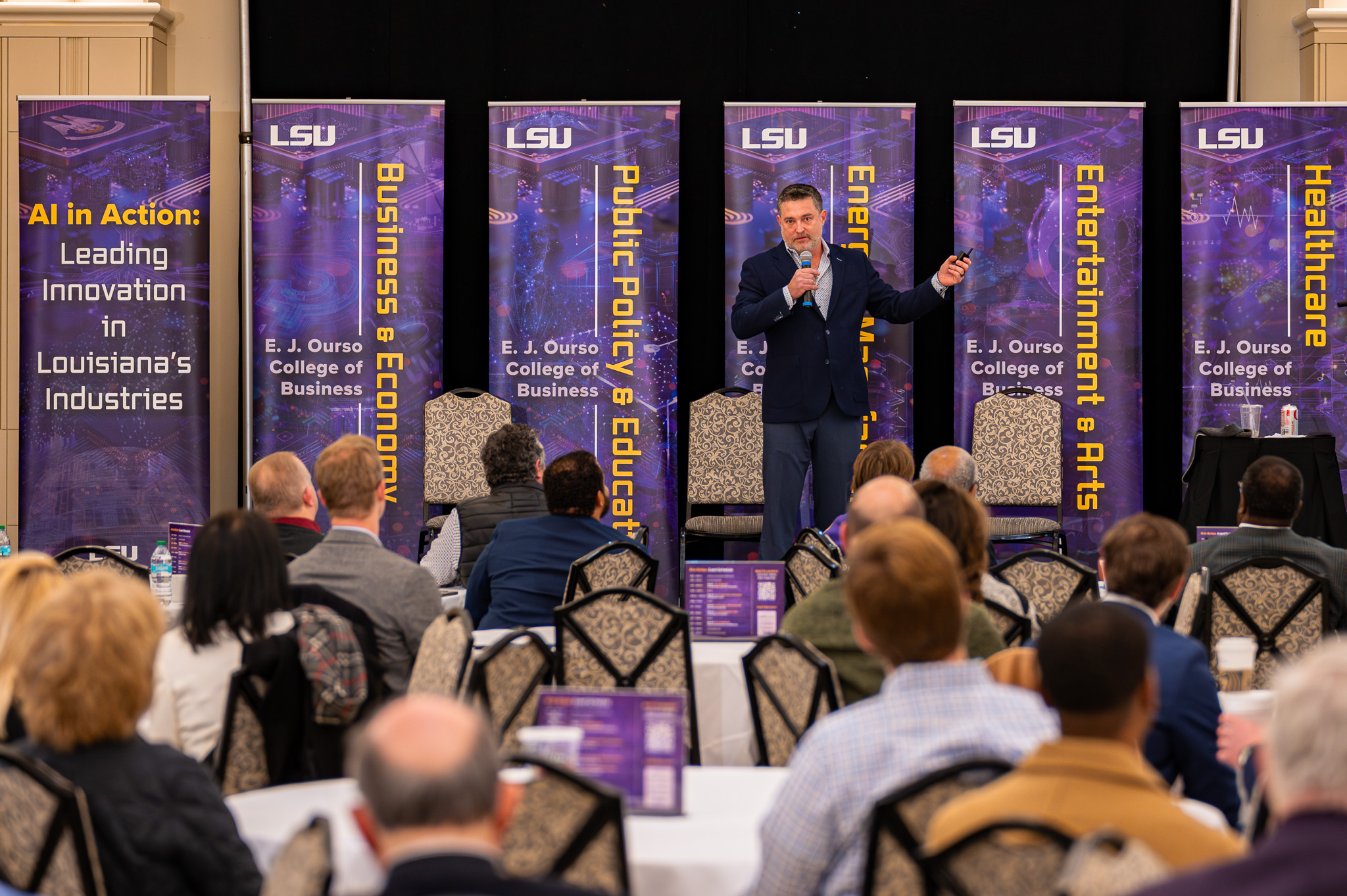 Darren Haas speaking at the AI in Action symposium.