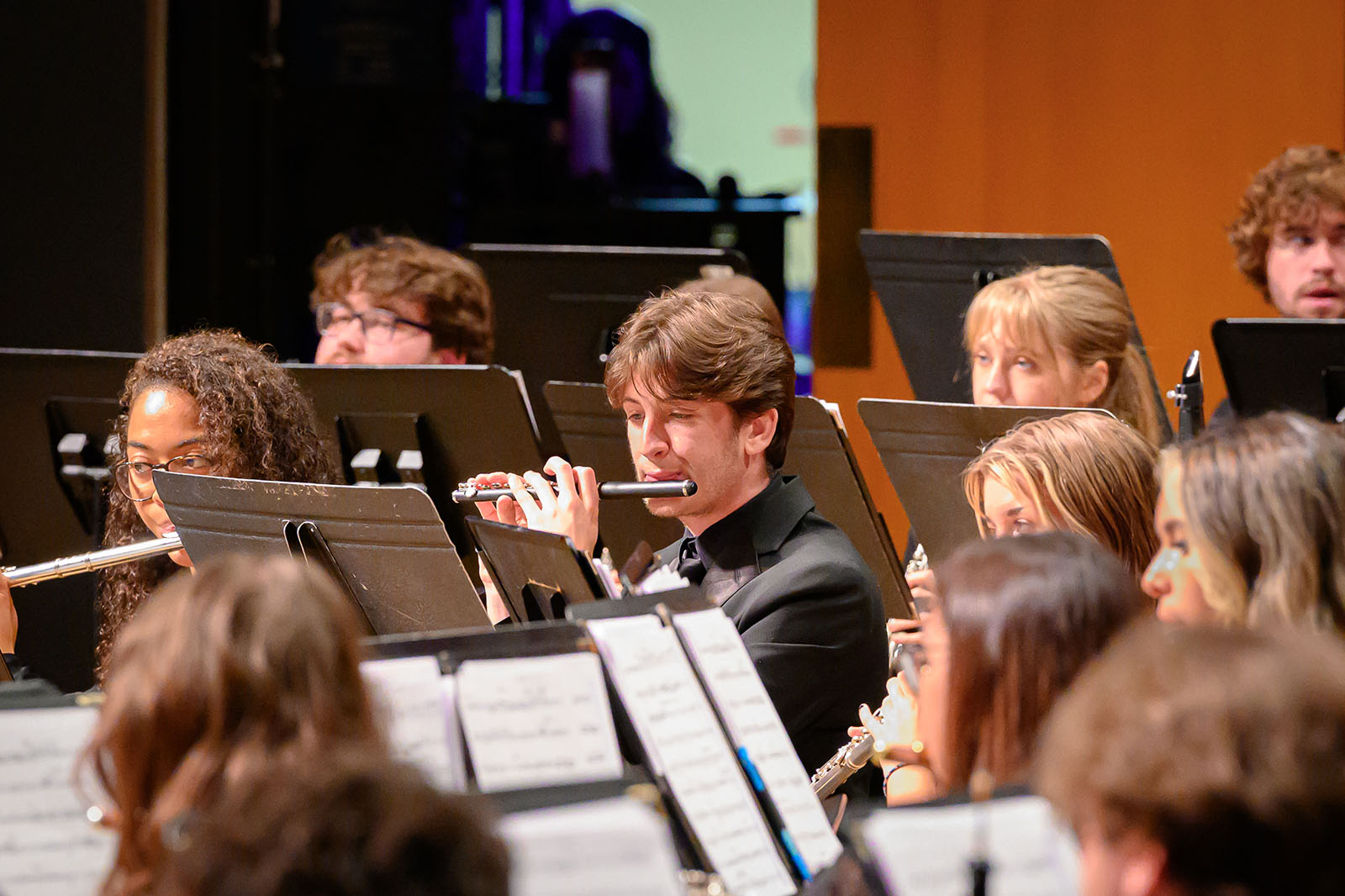 student performing on stage