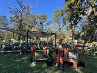 santa potman in front of hilltop nursery