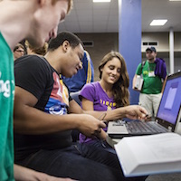 Computer science students work on group project.